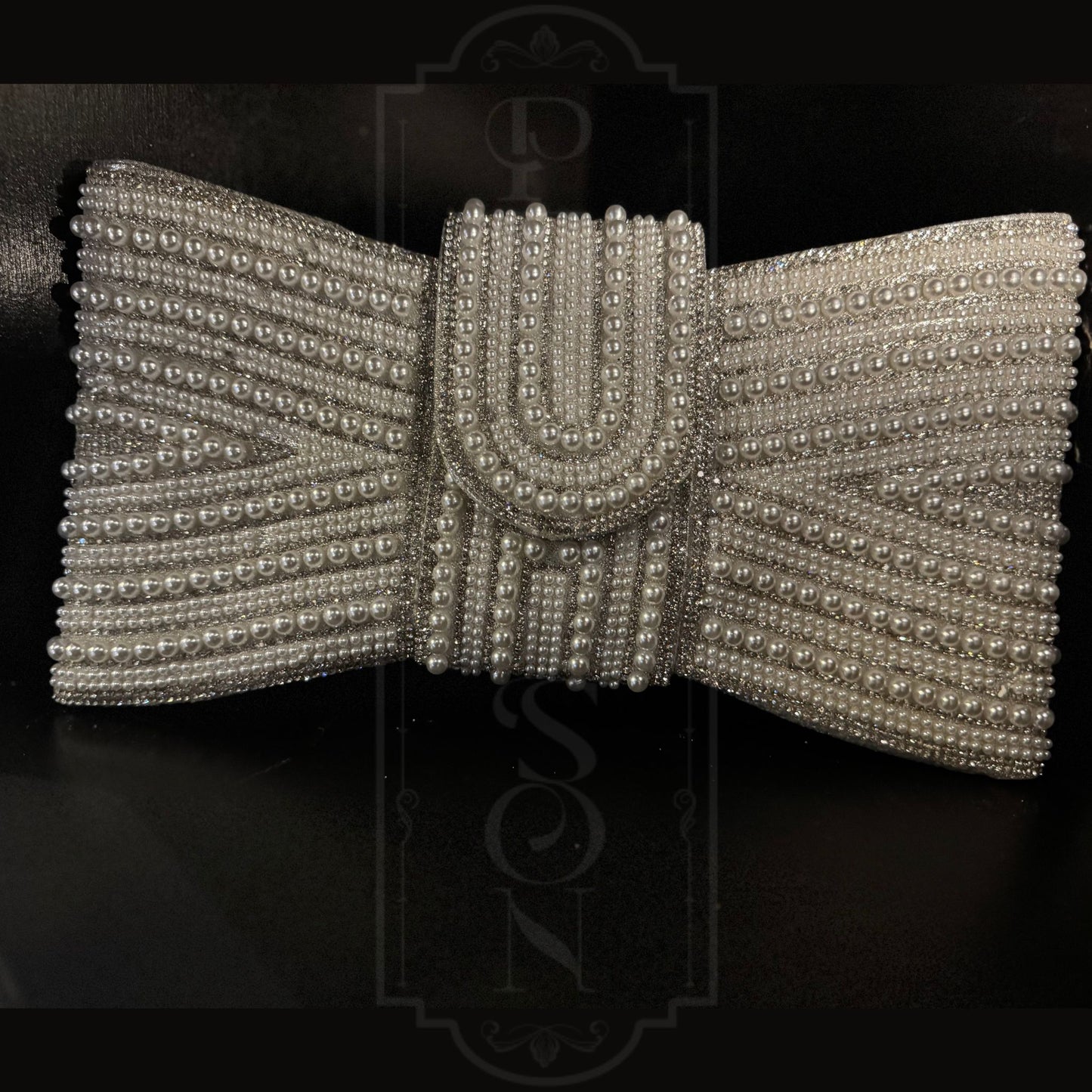 Opulent Bow Clutch